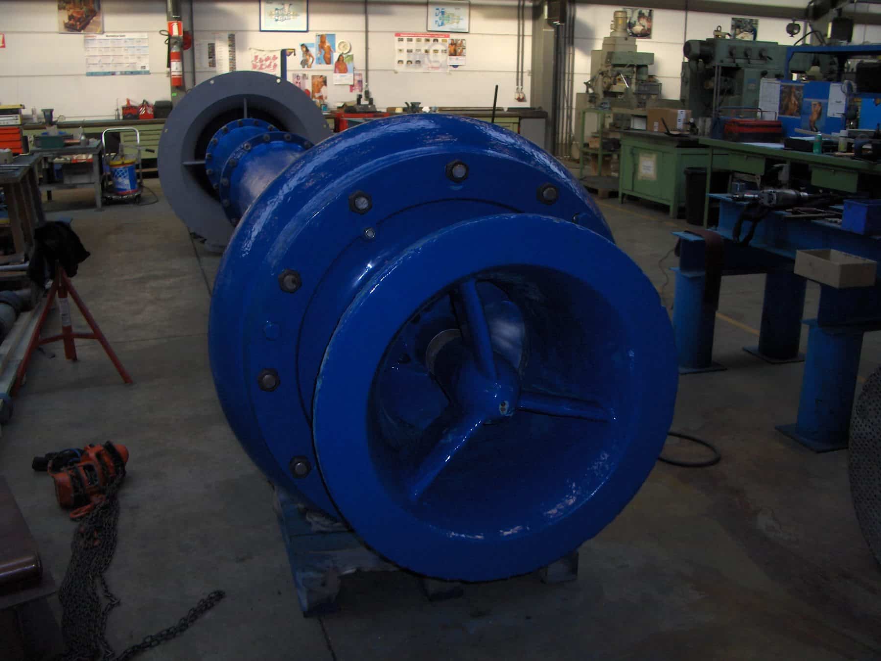cooling water pump painted in blue in workshop