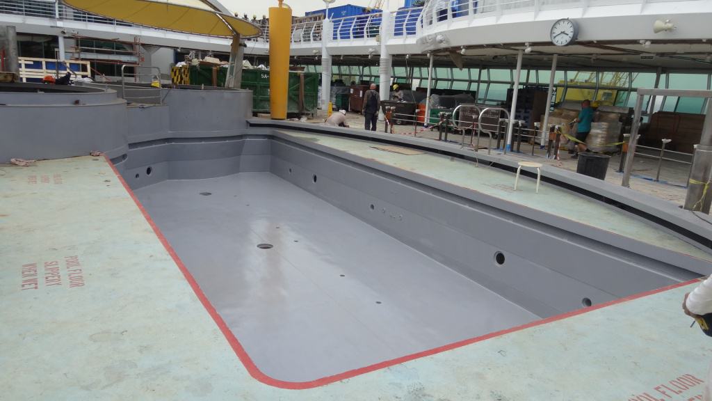 After Application of Primer grey painted swimming pool on cruise ship