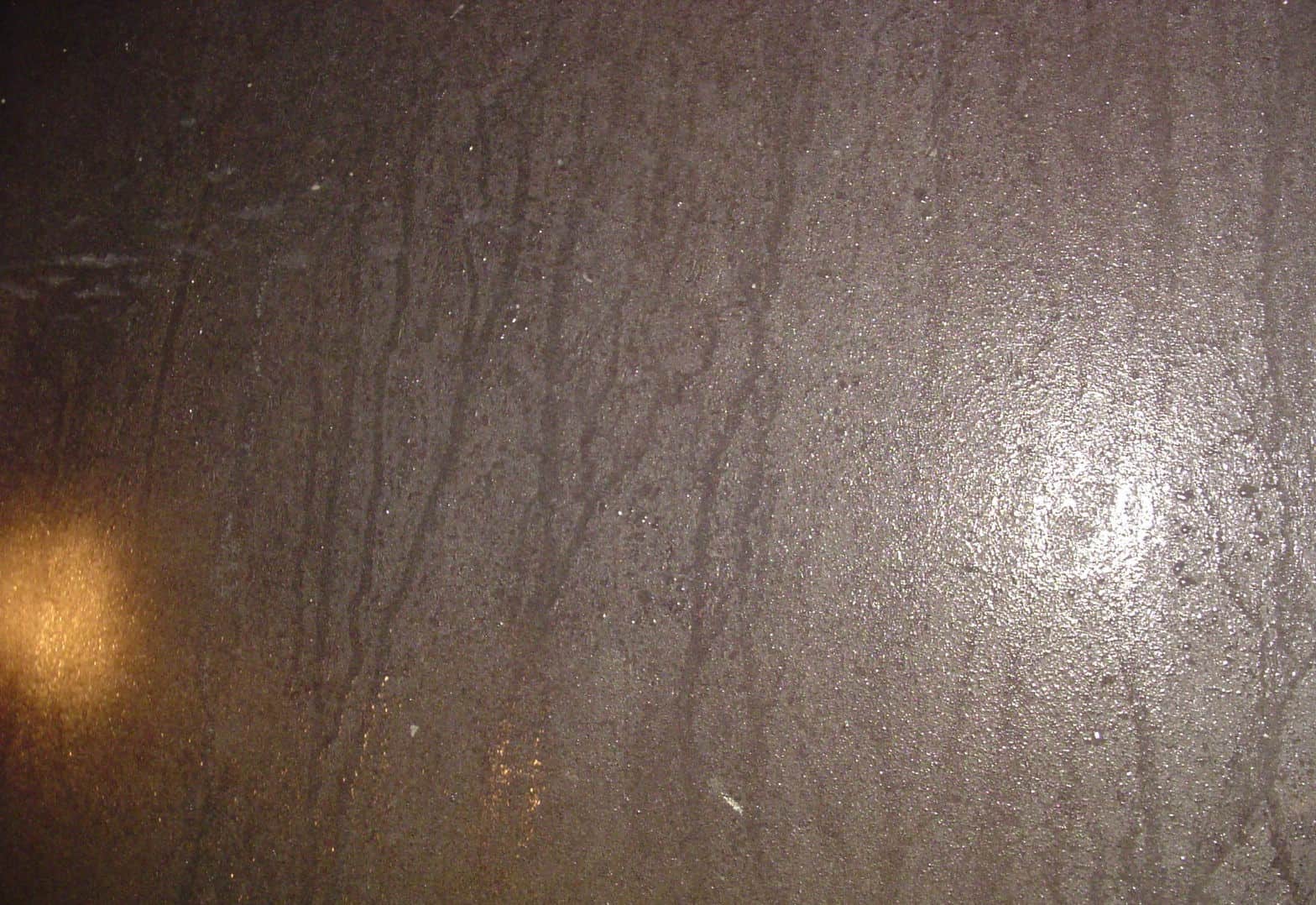 moisture lines on unpainted internal tank wall