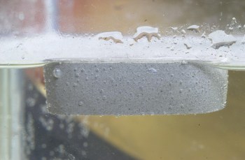 immersed object with concrete coating
