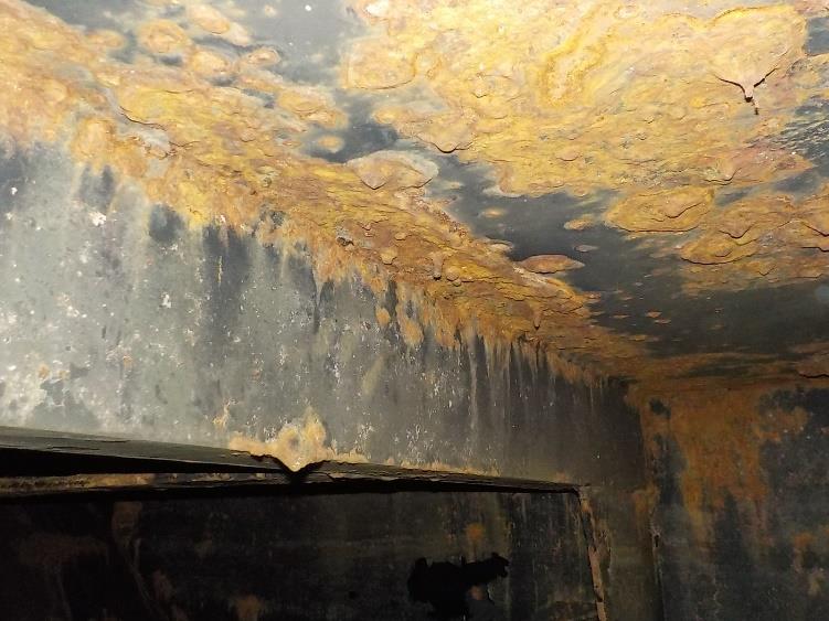 heavily rusted internal tank roof and walls