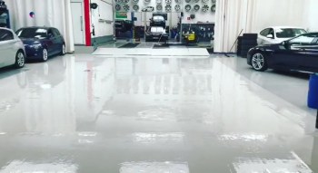 RG 800 glossy white painted floor in car showroom