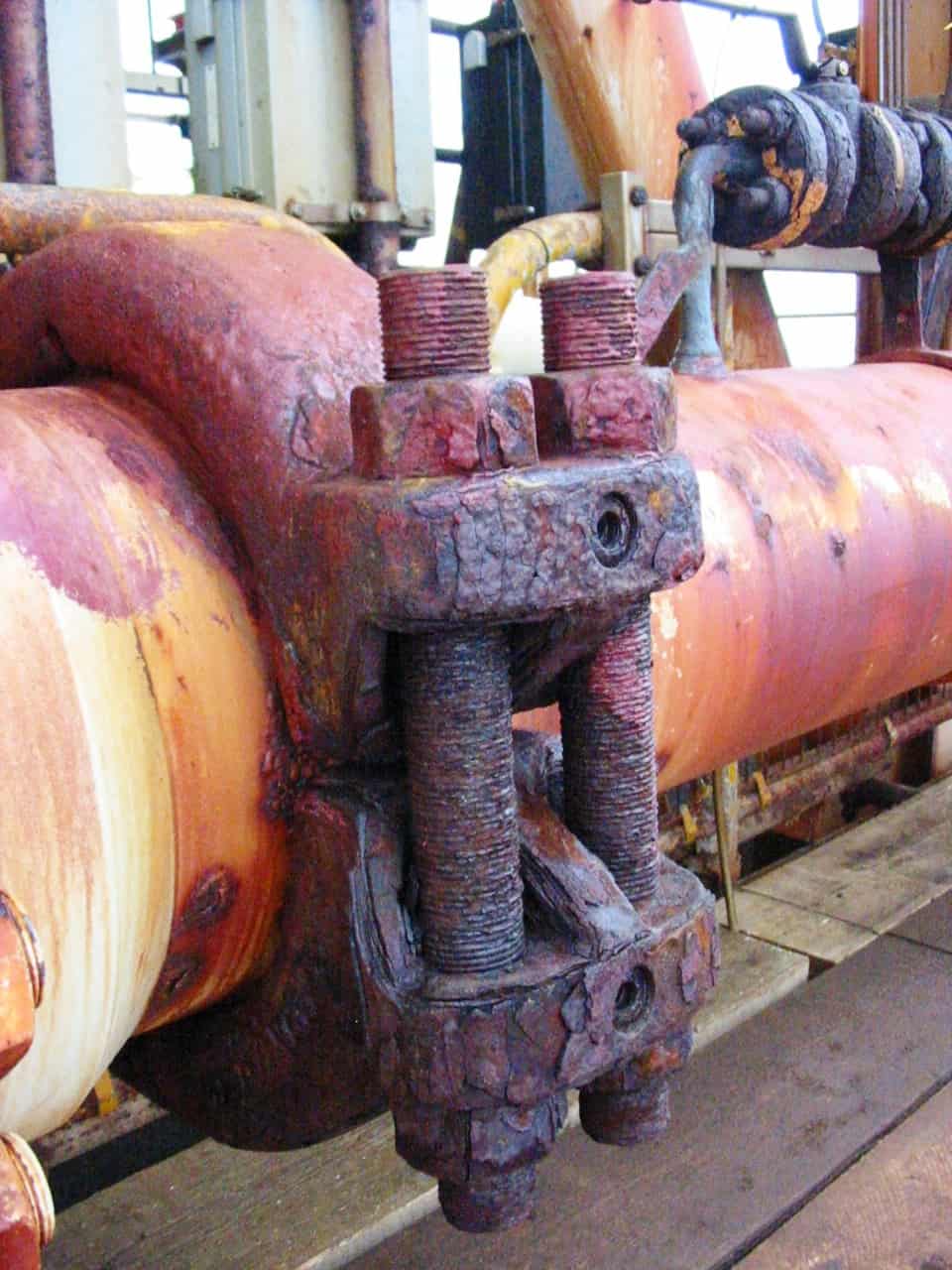 heavily rusted steel pipes and flanges