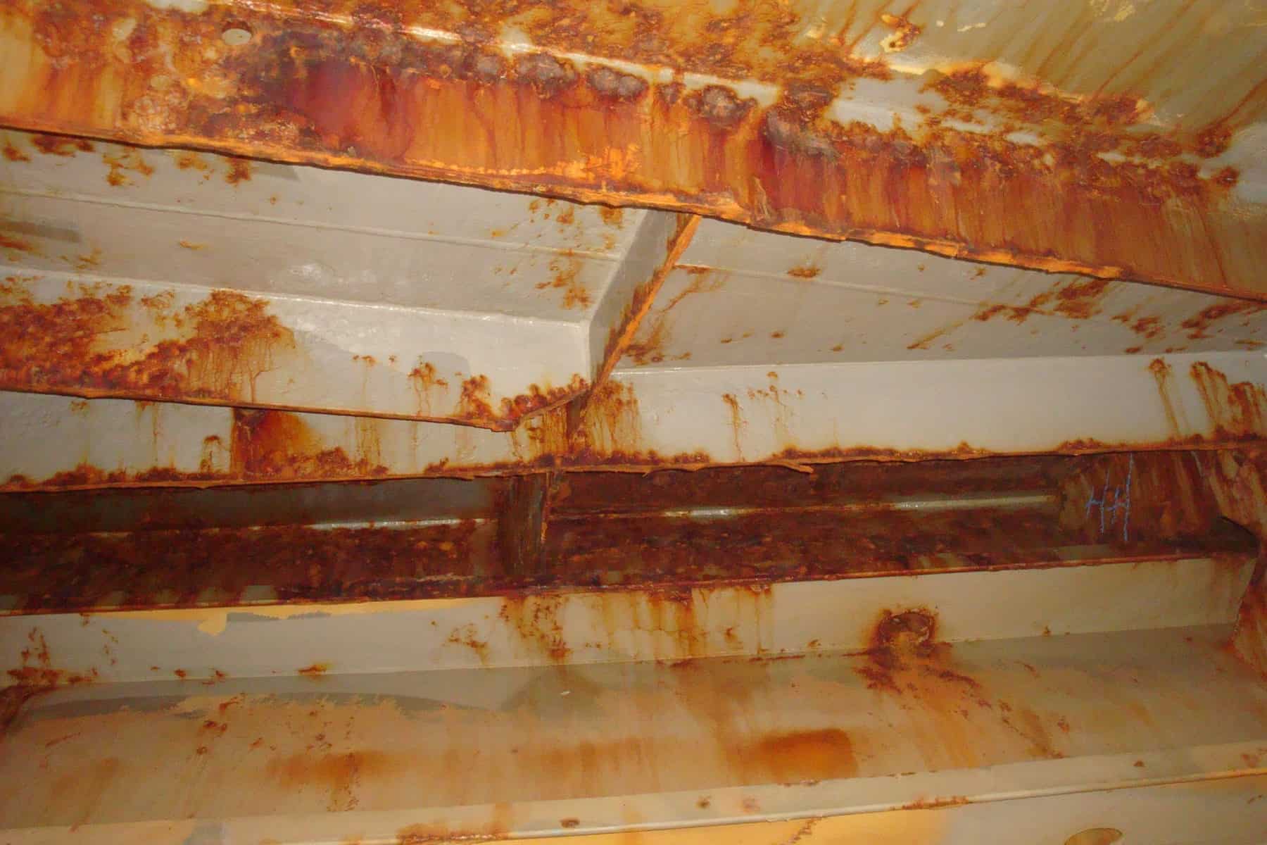 tank internals showing severe rust